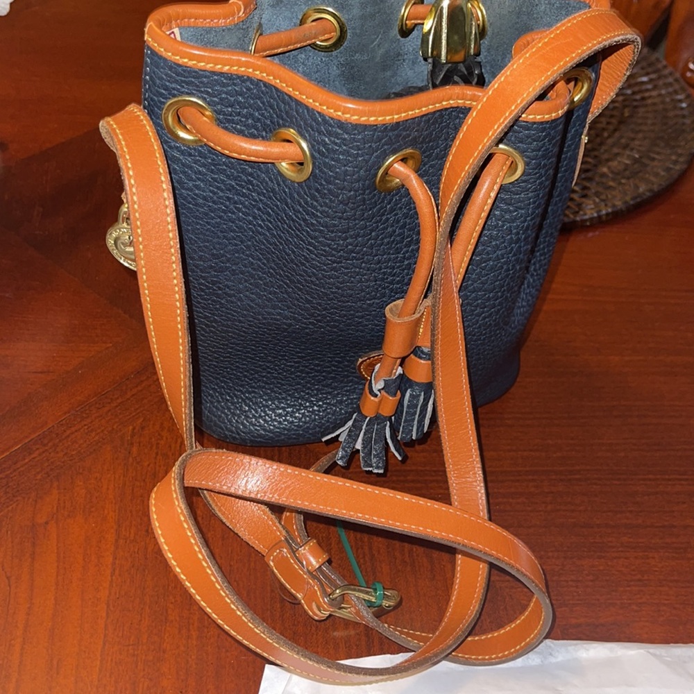 Dooney & Bourke Navy and Tan Pebbled Leather Drawstring Crossbody - Picture 4 of 9